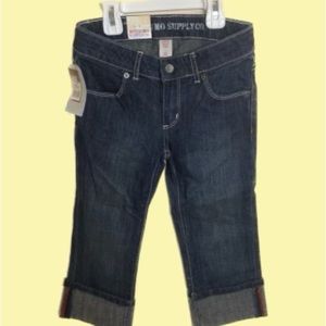 Girls size 7 cuffed blue jeans.